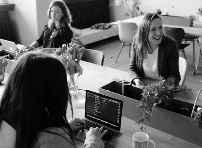 People Working on Computers in an Open Office